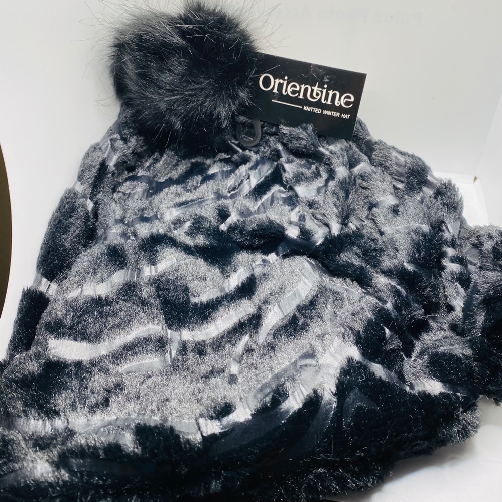 Faux fur hat in black Adult size. Velvety …
